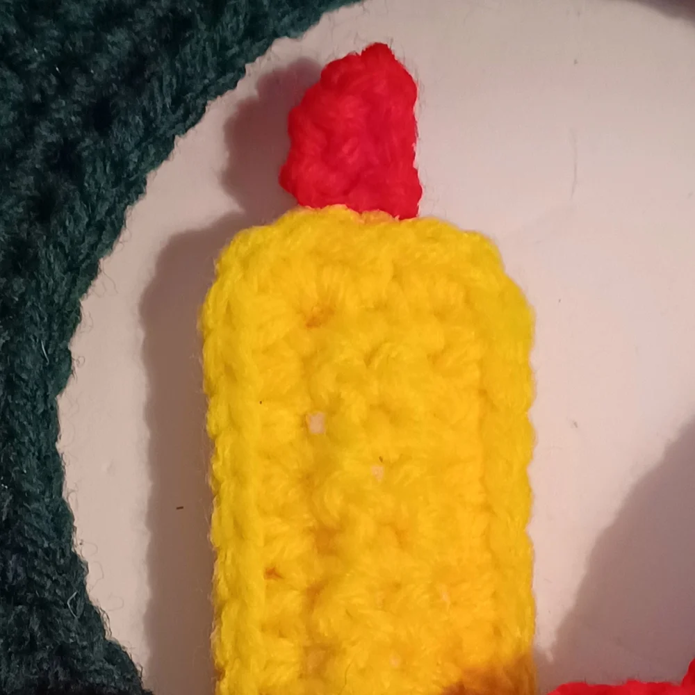 Crocheted Christmas Wreath with Candle, Bow, and Holly Berries
